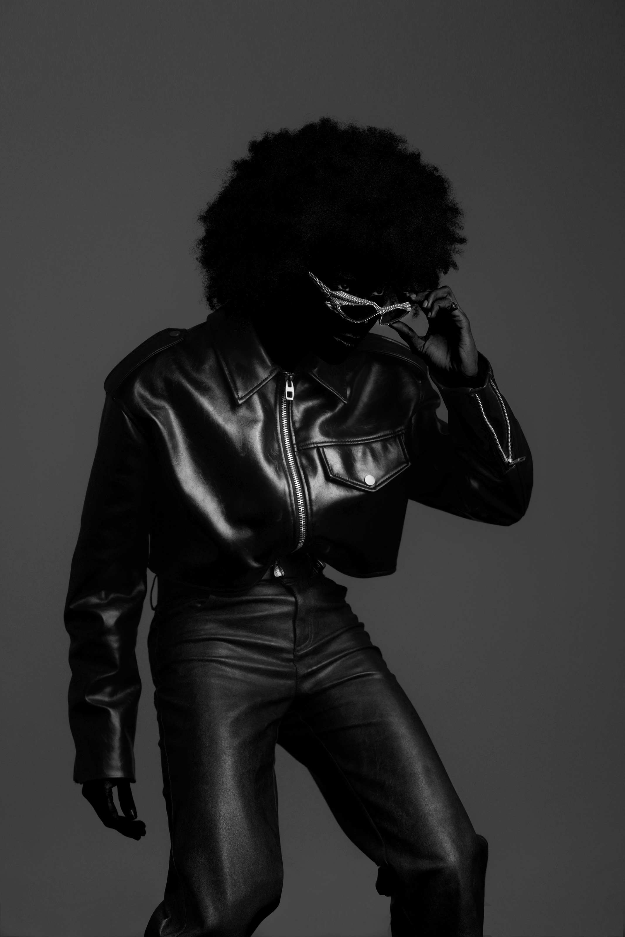 Monochrome leather fashion portrait with crystal eyewear