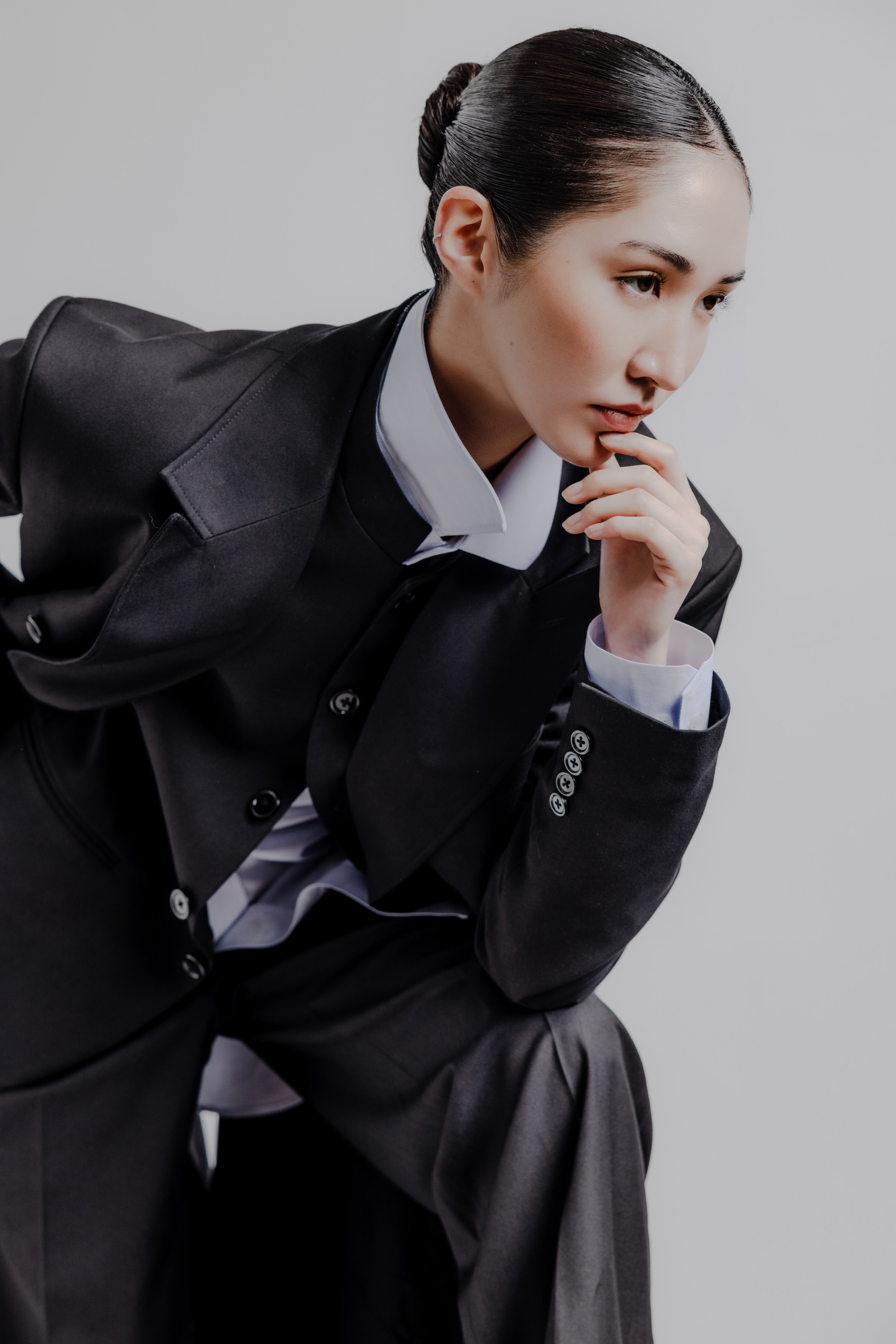 Tailored black suit fashion portrait