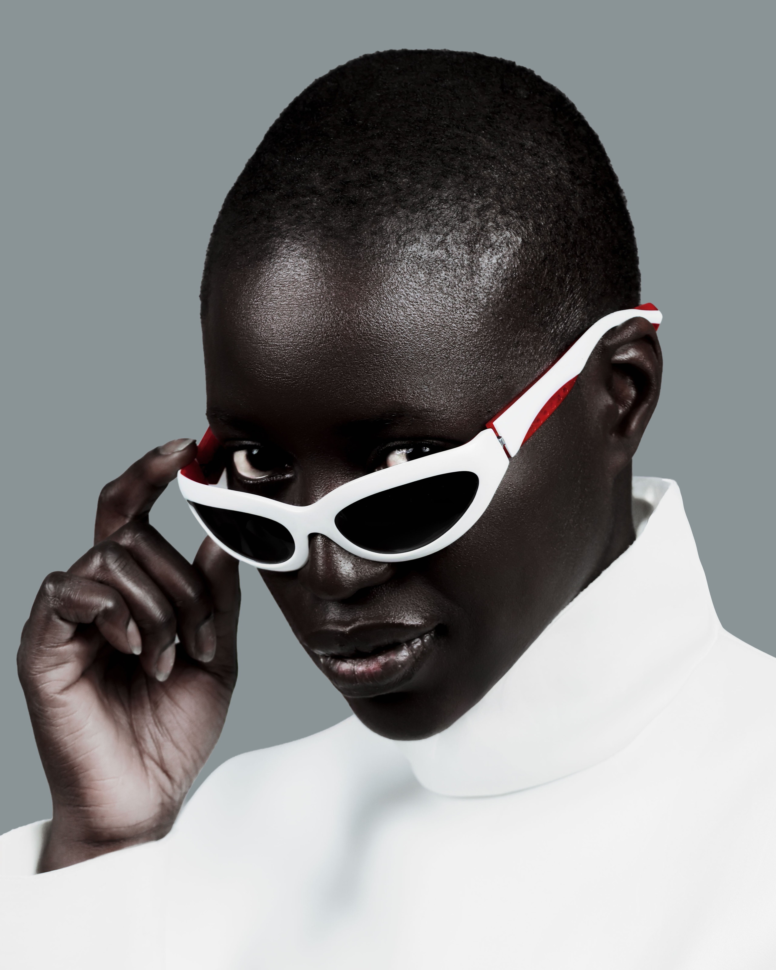 Beauty close-up with white graphic sunglasses